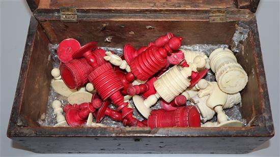 A barleycorn style stained and natural bone chess set